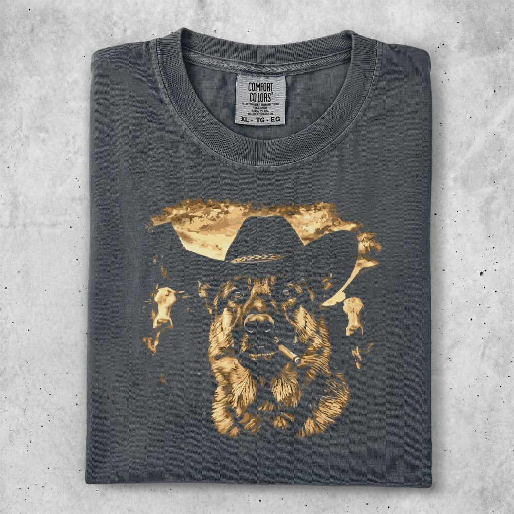 German Shepherd in cowboy hat and bandana, smoking a cigar.