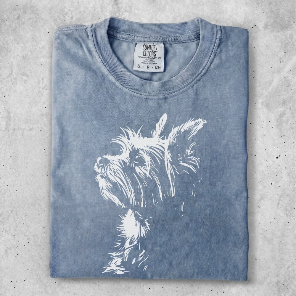 Blue t-shirt with a white terrier dog outline graphic.
