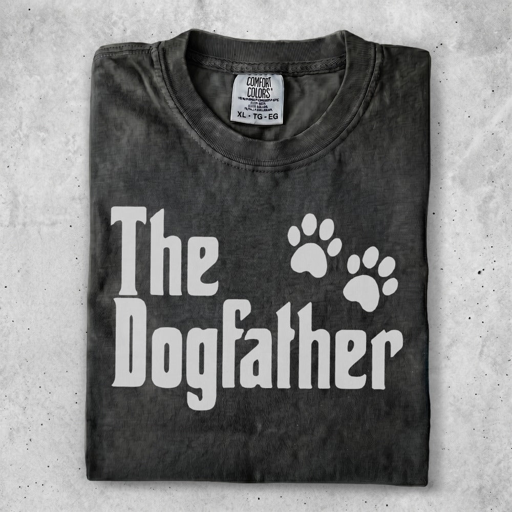Black t-shirt with "The Dogfather" and paw prints in white.