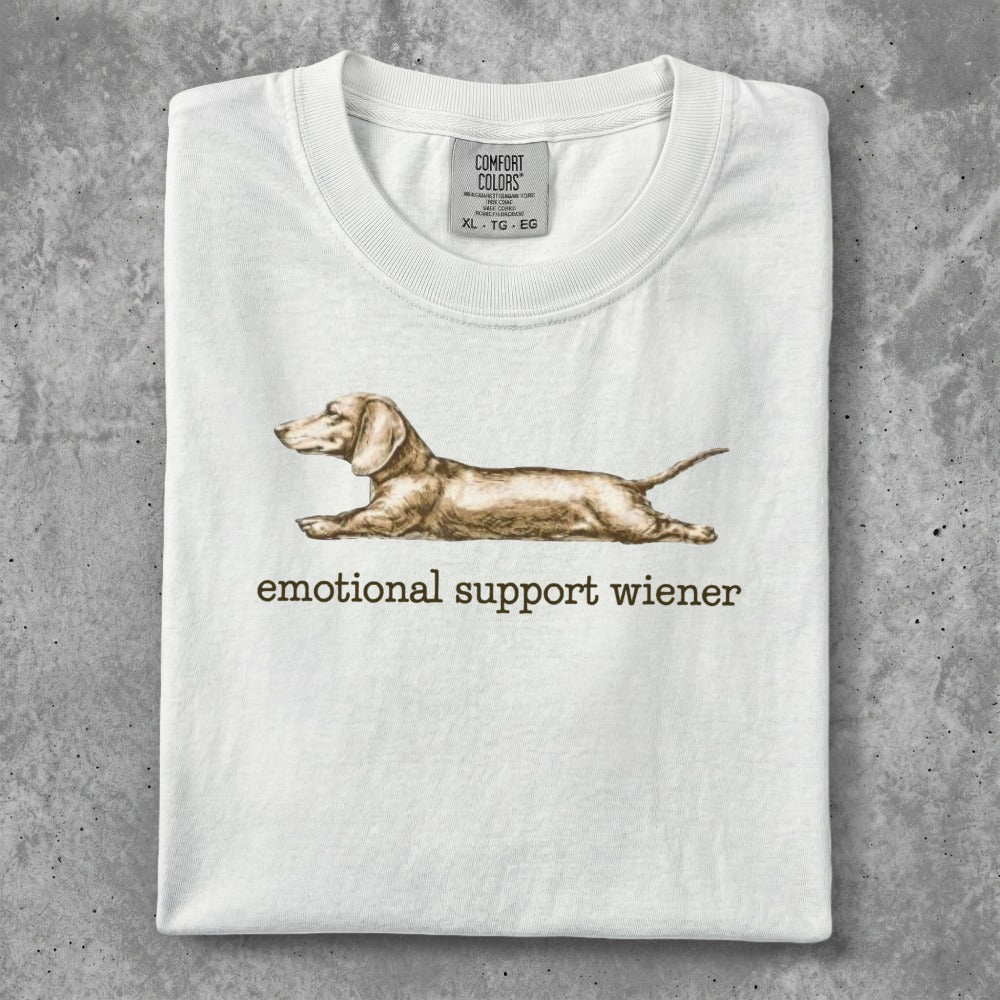 White t-shirt with "Emotional Support Wiener" and a dachshund illustration.