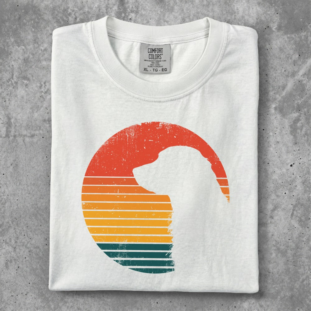 White t-shirt with a retro-style dog silhouette and sunset stripes.