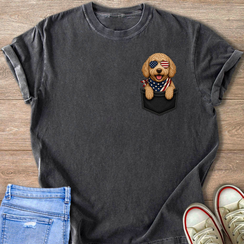 Dark grey t-shirt with a printed image of a dog wearing American flag bandana and sunglasses in a pocket.