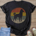 Black t-shirt with a distressed circular sunset graphic featuring a dog silhouette.