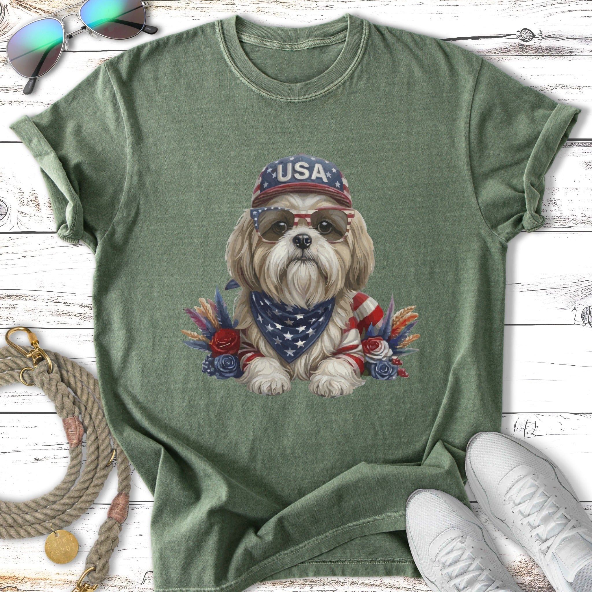 Shiba Inu dog wearing USA bandana and sunglasses, with patriotic decorations.