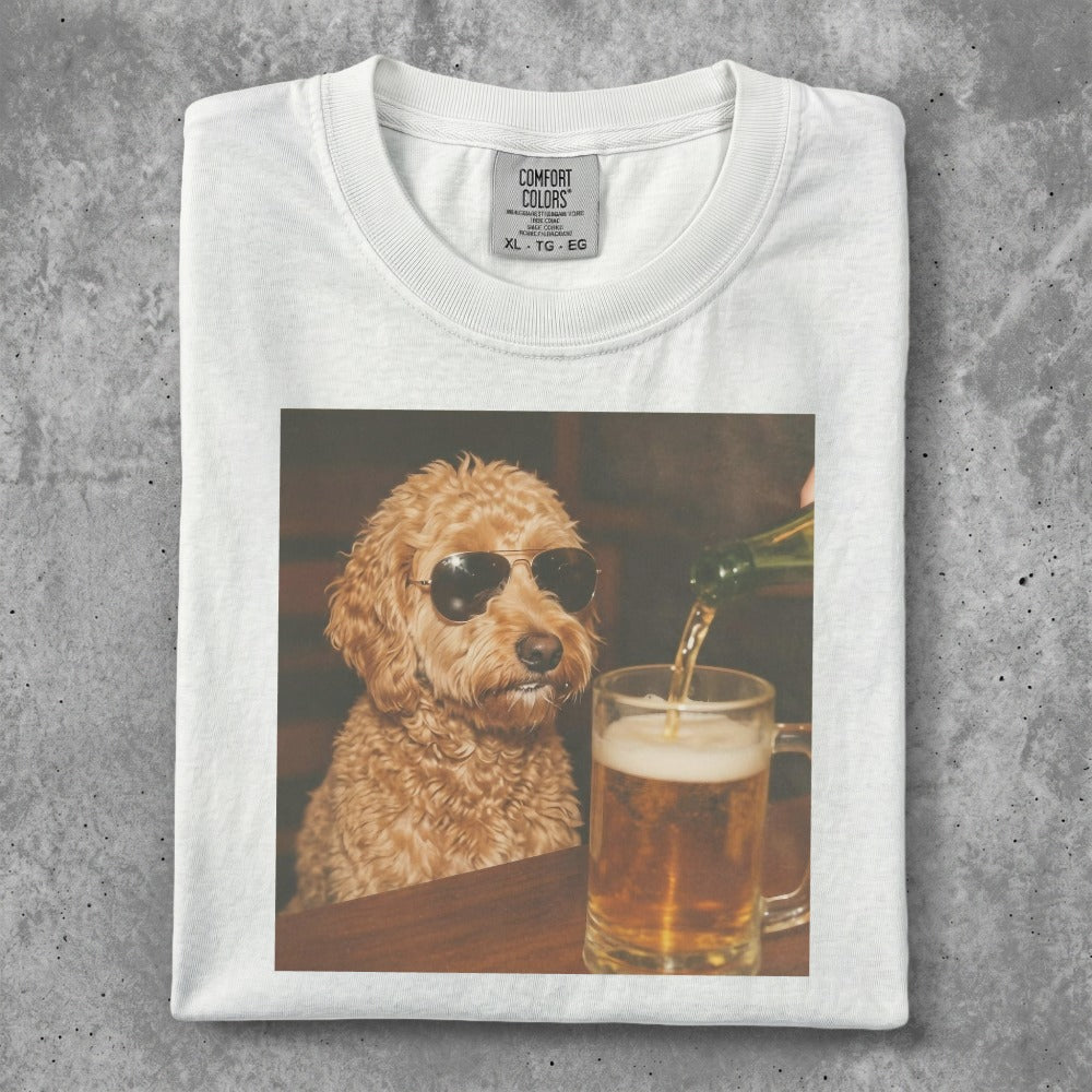 White t-shirt with a dog wearing sunglasses next to a beer.