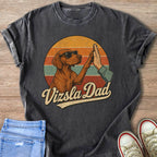 Vizsla Dad vintage graphic t-shirt with distressed print of a dog and person high-fiving.