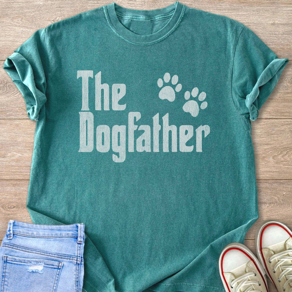 Teal t-shirt with white "The Dogfather" text and paw prints.