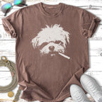 T-shirt with a white graphic of a shaggy dog's face smoking a cigarette.