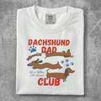 Dachshund Dad graphic tee with three dachshunds and text "life is better with doxies CLUB".