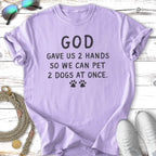 Lavender t-shirt with "God gave us 2 hands so we can pet 2 dogs at once."