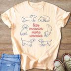 Peach t-shirt with "Less meanies more weenies" and dachshund illustrations.