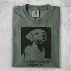 Green t-shirt with a black ink drawing of a golden retriever and text.