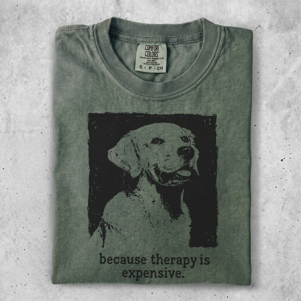 Green t-shirt with a black ink drawing of a golden retriever and text.