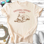 Cream t-shirt with "EMOTIONAL SUPPORT POTATO" text and French bulldog graphic.