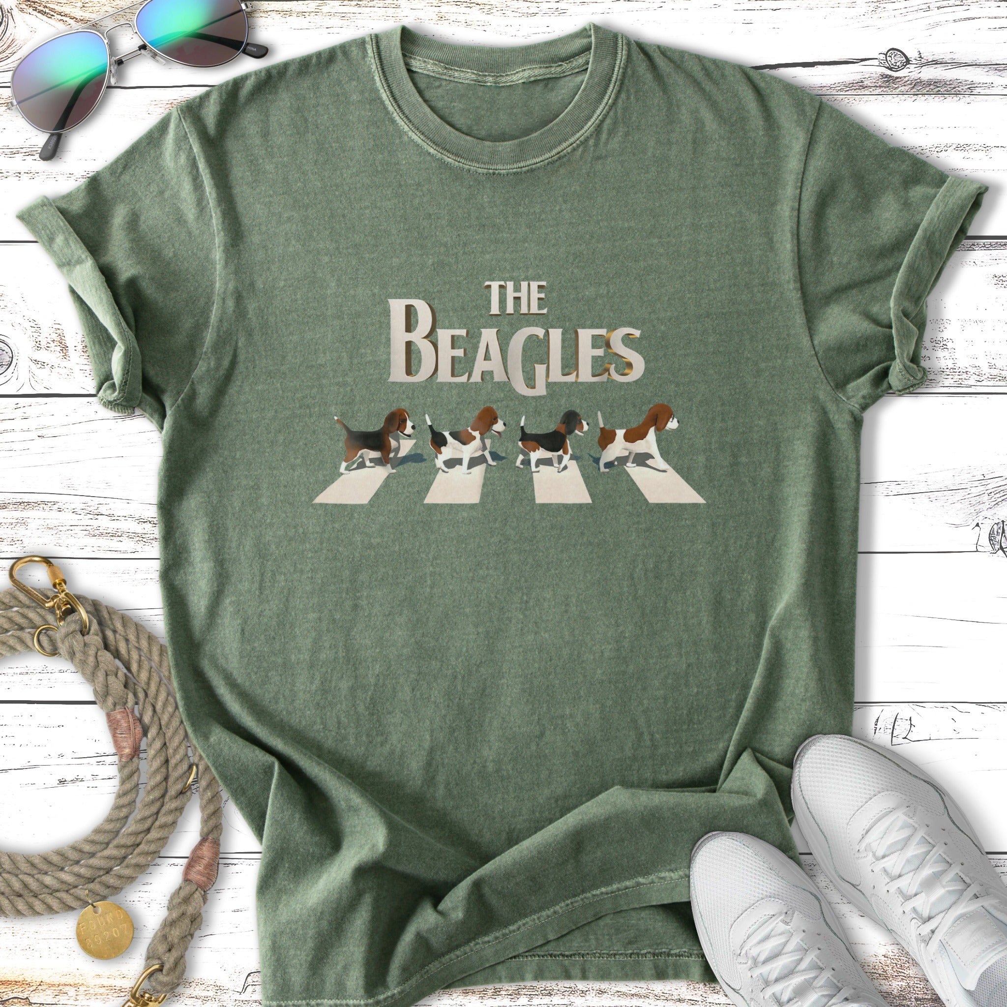 Beagles walking across Abbey Road on a green t-shirt.