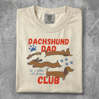 Dachshund Dad Club t-shirt with playful dachshund graphics and text.