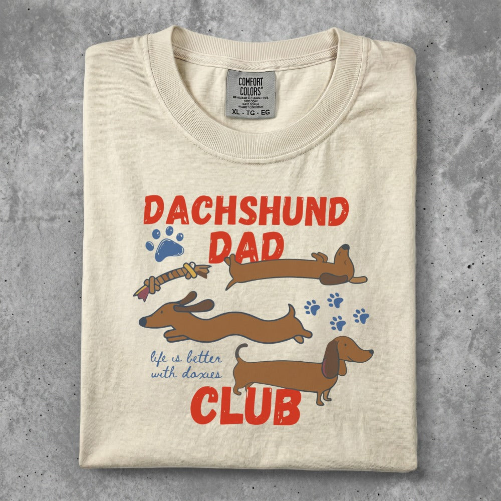 Dachshund Dad Club t-shirt with playful dachshund graphics and text.