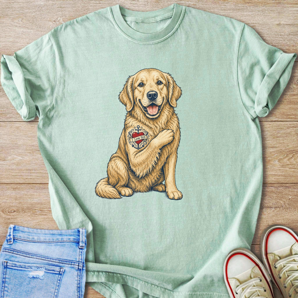 Light green t-shirt with a golden retriever holding its paw over an "I Love Mom" tattoo.