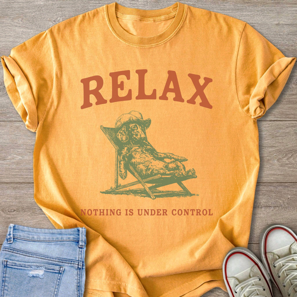 Orange t-shirt with "RELAX" and a dog lounging in a chair, text "NOTHING IS UNDER CONTROL".