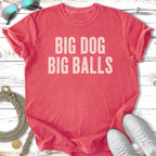 Coral t-shirt with "BIG DOG BIG BALLS" text and white sneakers.