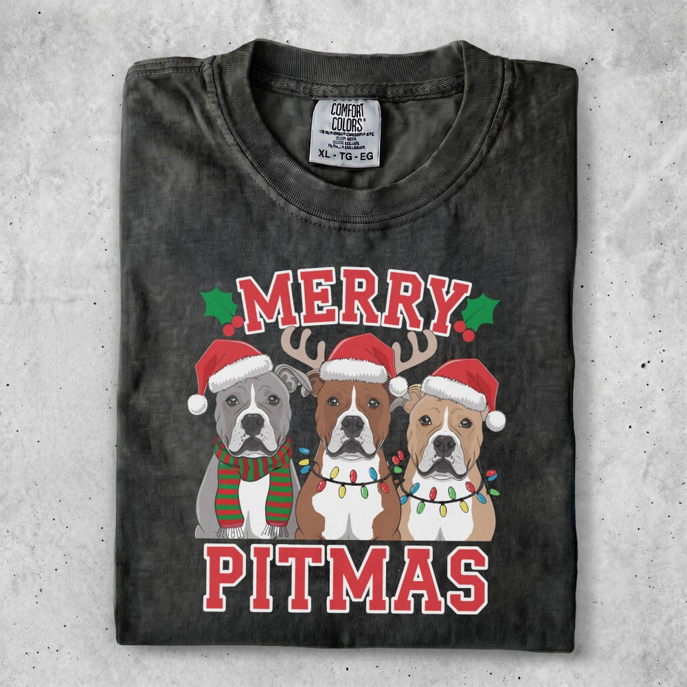 Three pit bulls wearing Santa hats and Christmas lights wish "Merry Pitmas."