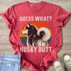 Red t-shirt with a graphic of a husky and text "GUESS WHAT? HUSKY BUTT".
