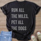 Dark grey t-shirt with "RUN ALL THE MILES, PET ALL THE DOGS" text.
