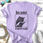 Purple t-shirt with black illustration of a cat and text "become ungovernable".
