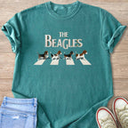 Green t-shirt with "The Beagles" text and four beagles walking on a crosswalk.