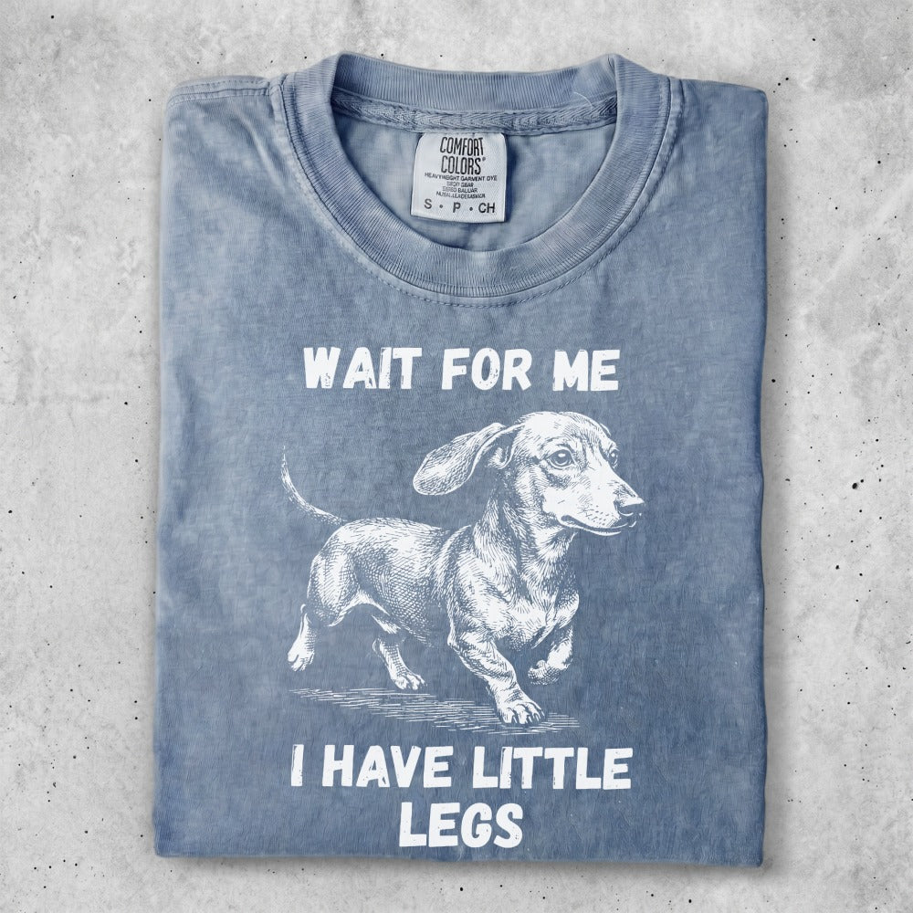 T-shirt with dachshund graphic and "WAIT FOR ME I HAVE LITTLE LEGS" text.
