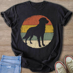 Black t-shirt with a distressed circular design featuring a dog silhouette and retro stripes.