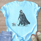 Darth Vader walks an AT-ST on a leash, a humorous graphic on a light blue t-shirt.