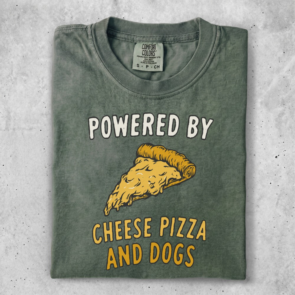 Green t-shirt with "Powered by Cheese Pizza and Dogs" text and pizza slice graphic.