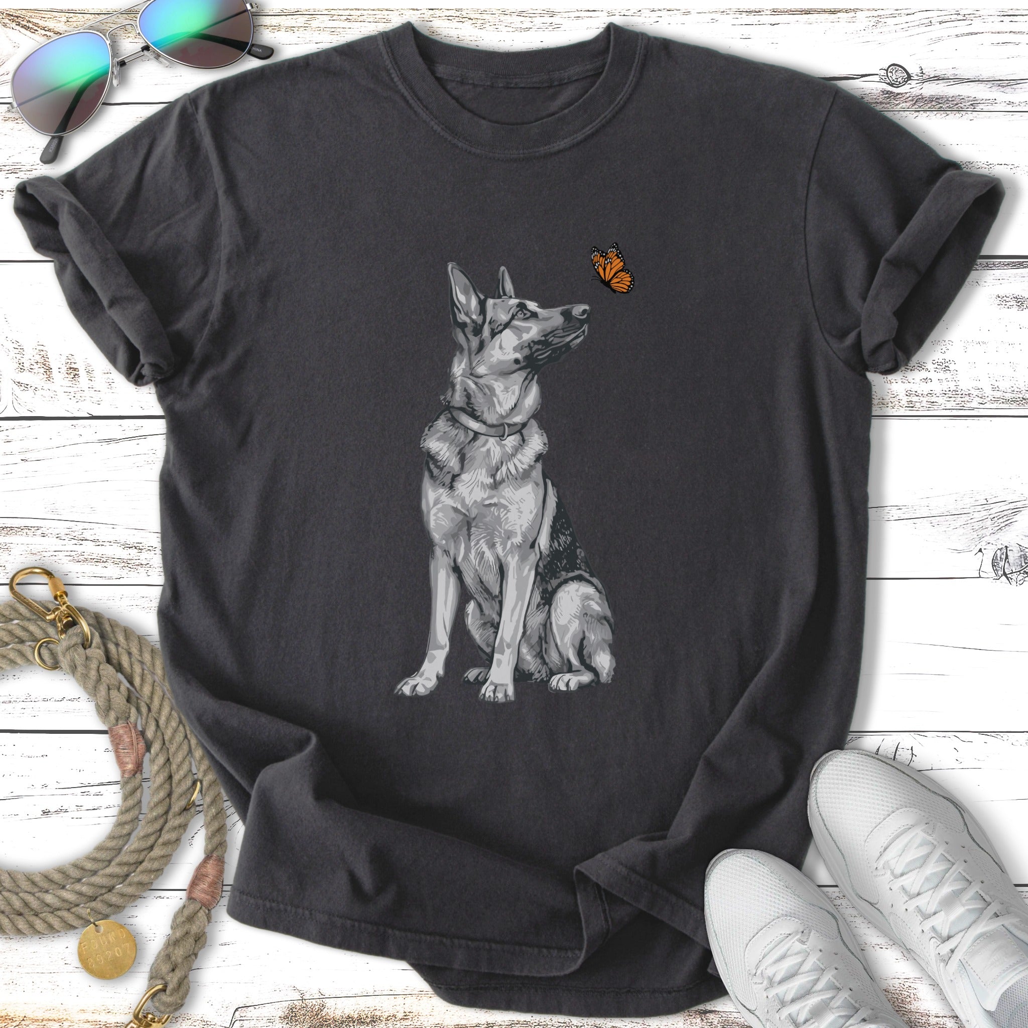 T-shirt with a German Shepherd looking at a butterfly.