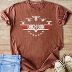Rusty brown t-shirt with "DACH GUN" text and dachshund silhouettes.