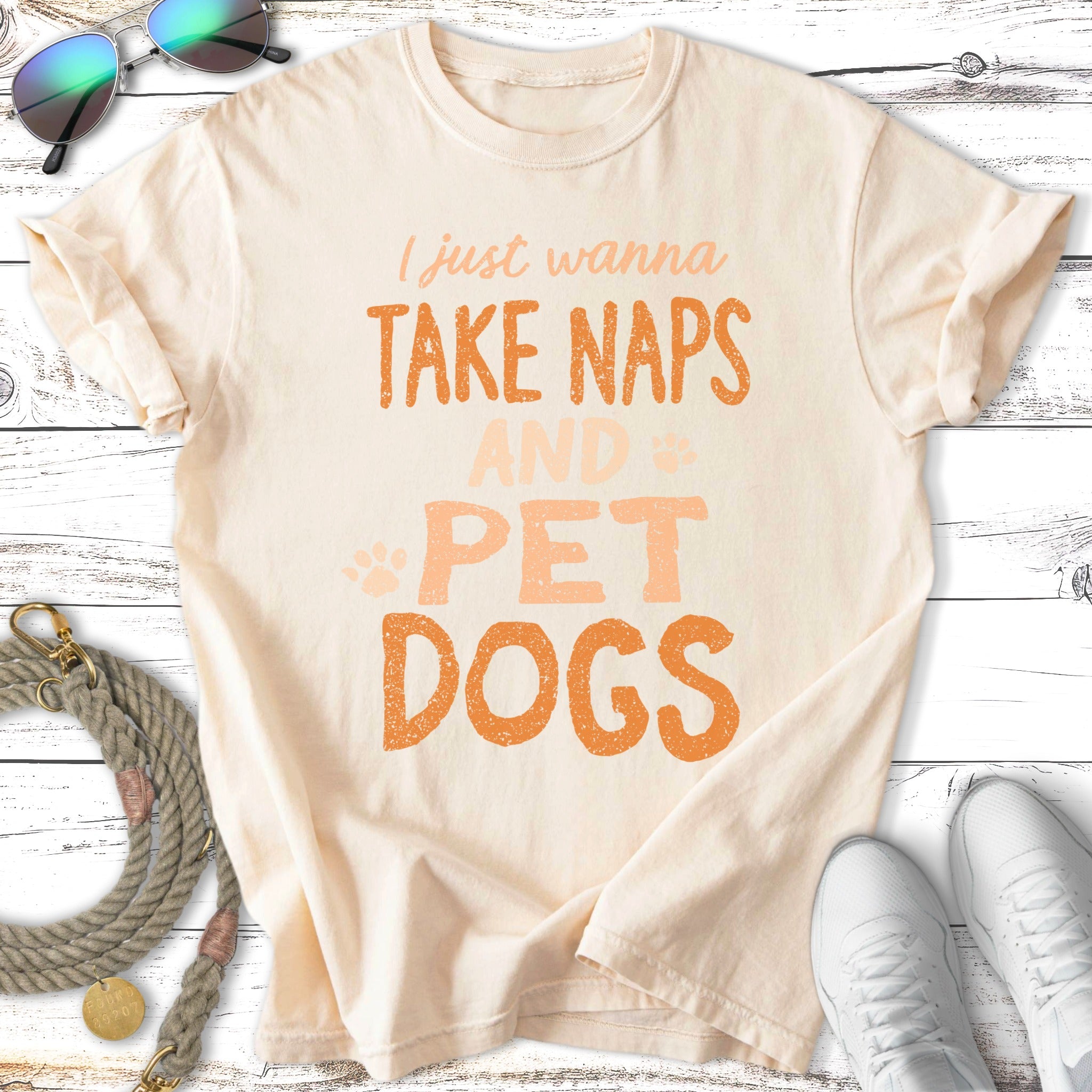 Cream t-shirt with "I just wanna TAKE NAPS AND PET DOGS" text.