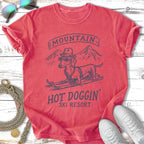 T-shirt graphic featuring a dachshund in sunglasses skiing at Mountain Hot Doggin' Ski Resort.