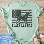 Light green t-shirt with black lab and American flag graphic and text "BLACK LAB DAD".