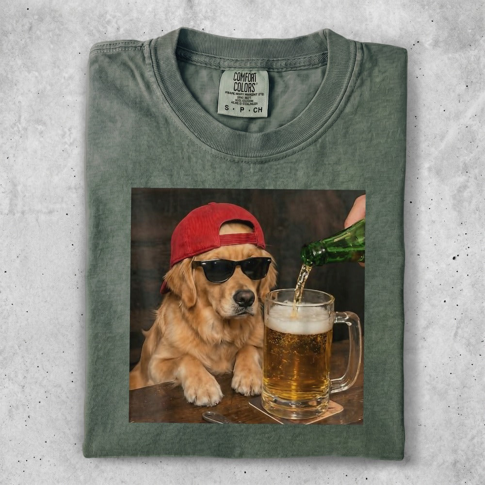 Golden retriever wearing sunglasses and a red cap pours beer into a mug.