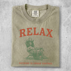 T-shirt with "RELAX" and distressed graphic of person in chair.