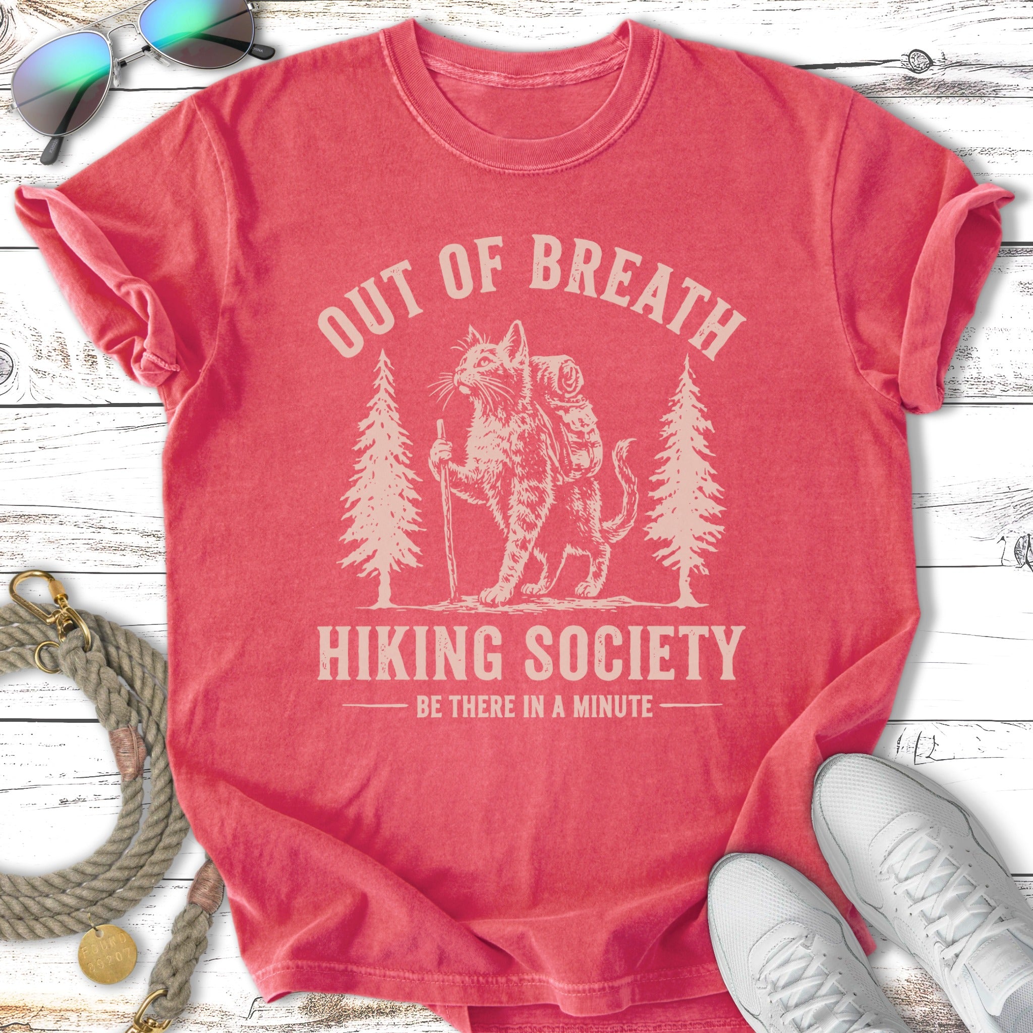 Red t-shirt with "Out of Breath Hiking Society" text and a cat hiking.