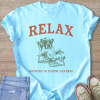 Light blue t-shirt with "RELAX" text and a dog in a lounge chair.