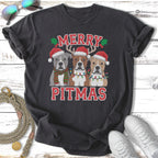 Three Pitbulls in Santa hats wearing Christmas lights and the text "Merry Pitmas".
