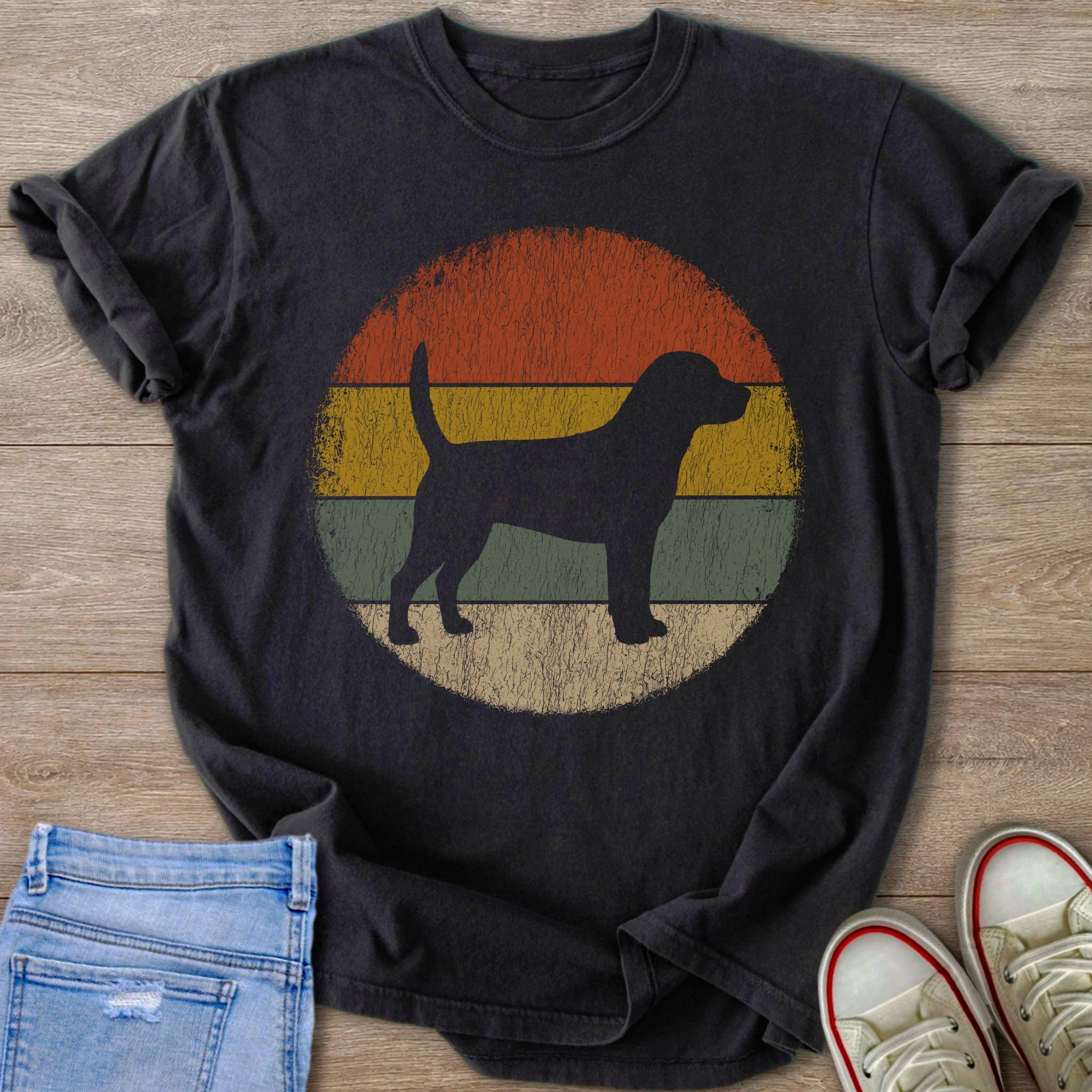 Black t-shirt with a retro-style circle design featuring a dog silhouette.