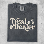 Comfort Colors charcoal t-shirt with "Treat Dealer" and paw print graphic.