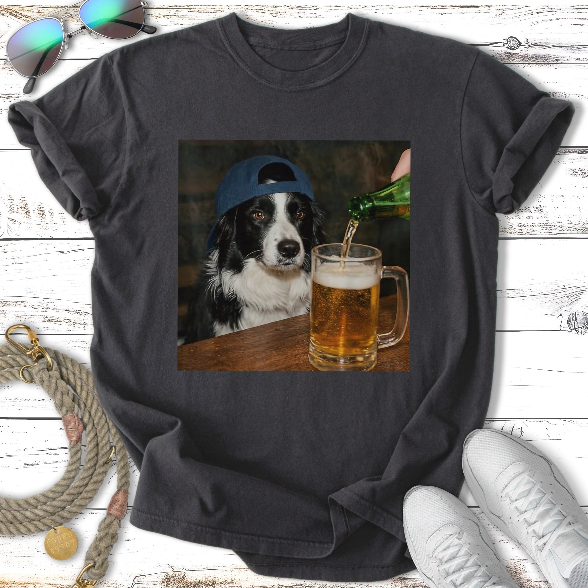 Border collie wearing a baseball cap pours beer into a mug.