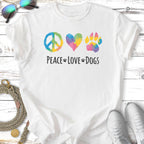 T-shirt with watercolor peace sign, heart, and paw print with "Peace Love Dogs" text.