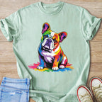 French bulldog with rainbow-colored fur sitting on colorful splatters.