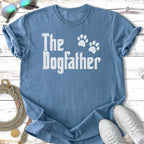 Blue t-shirt with "The Dogfather" text and paw prints.
