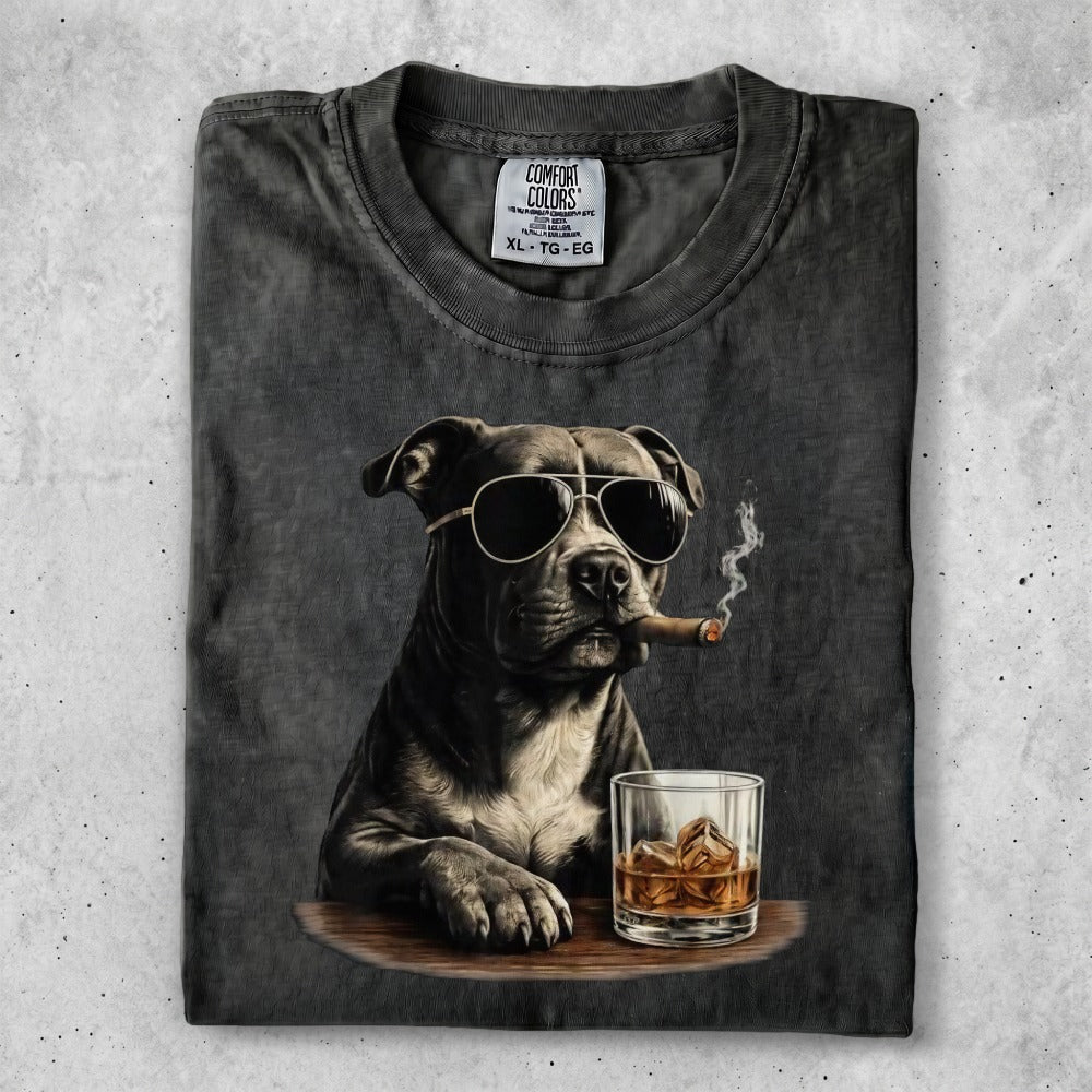 Dog in sunglasses smoking a cigar with whiskey on a t-shirt.